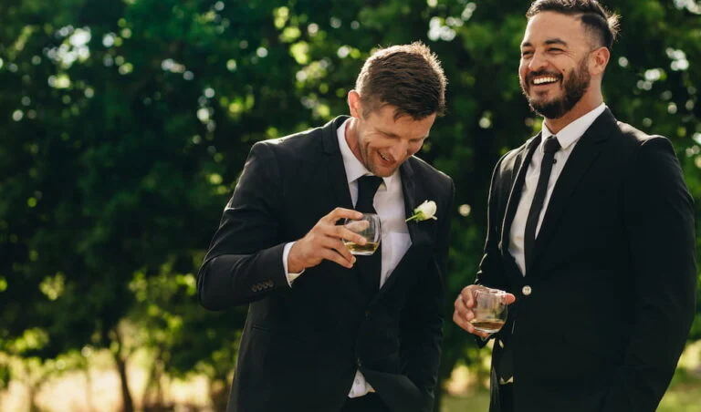 Smiling wedding attendees