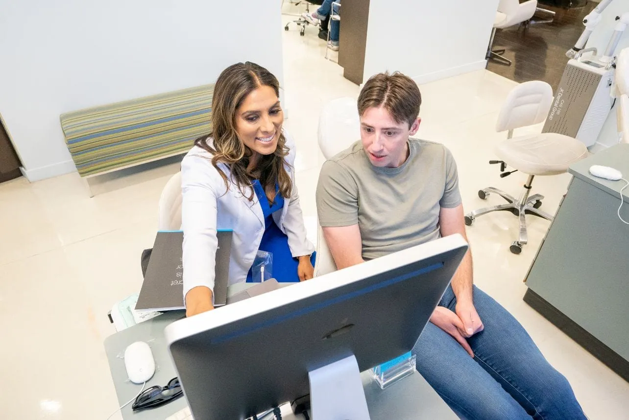 Dr. Monica Madan with a happy patient