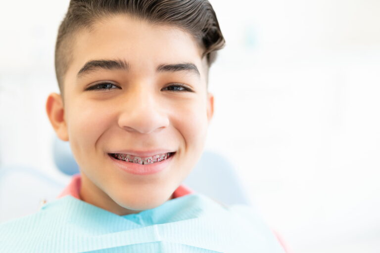 young man with braces at orthodontist in encino, ca