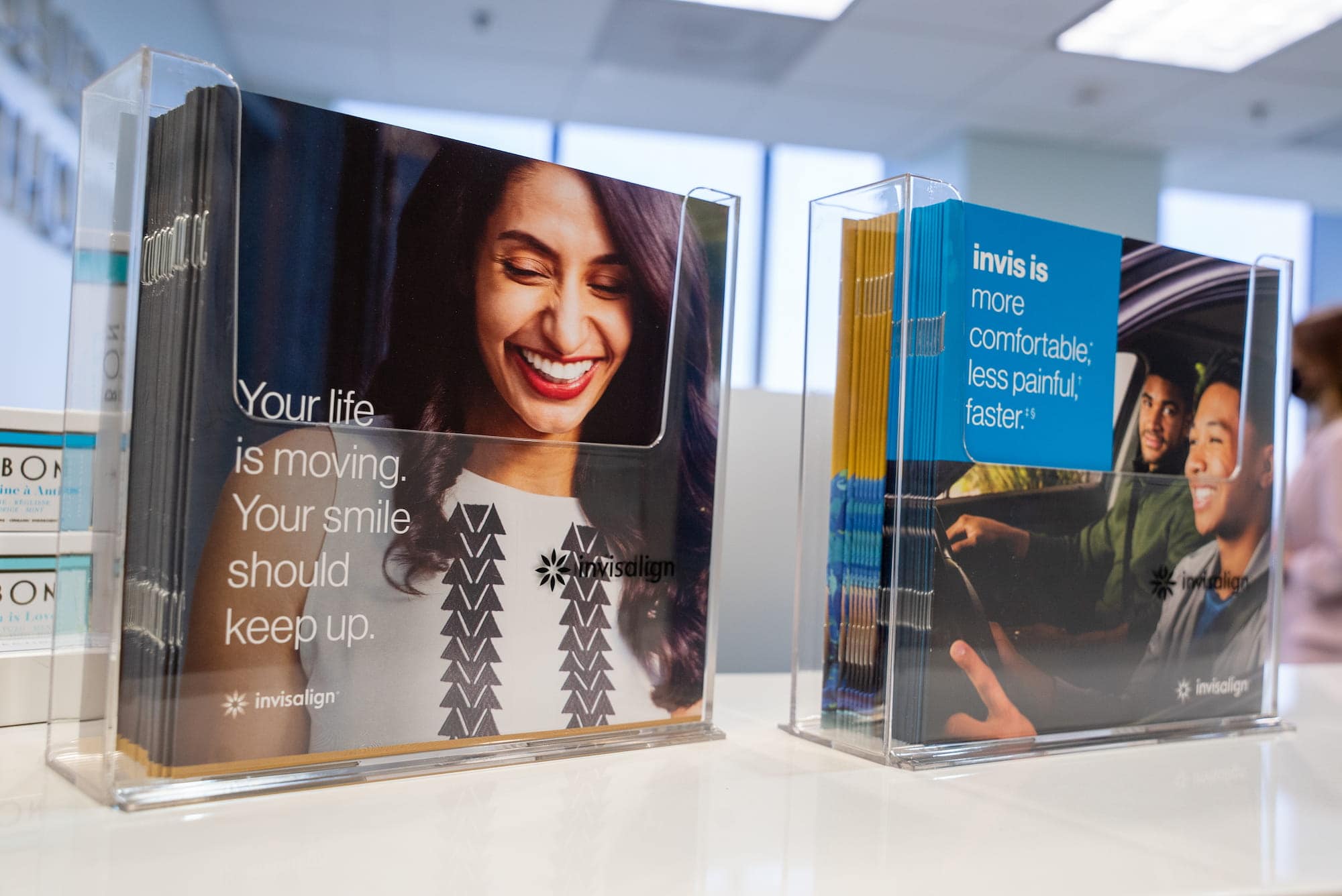 A display of Invisalign promotional material.