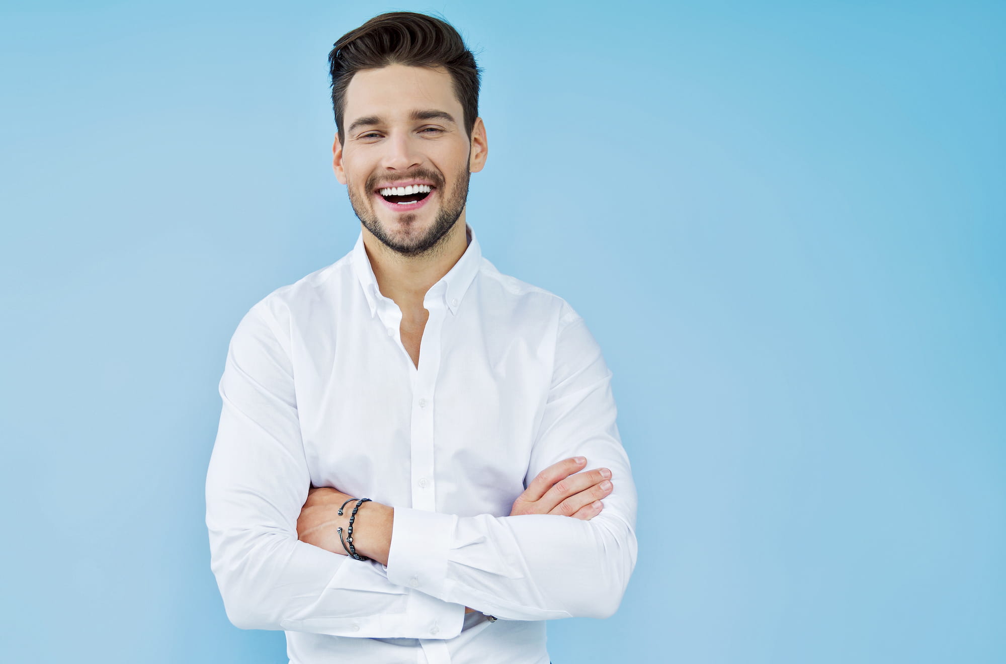 A Hollywood man smiles.