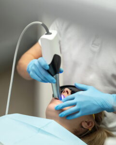 Clinician using iTero intraoral scanner